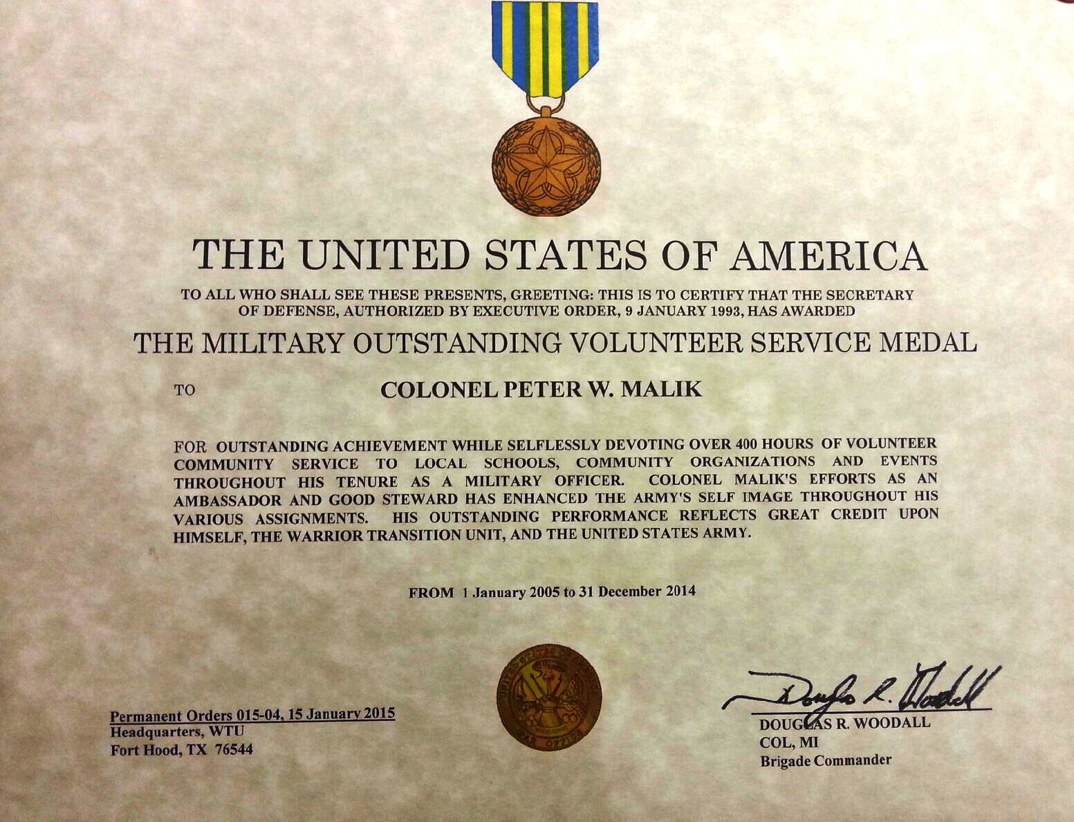 Police Officer and U.S. Army Colonel Peter Malik Recieves Military
